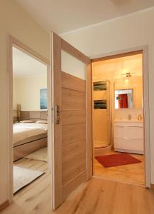 Posteľ alebo postele v izbe v ubytovaní Comfort Warszawa