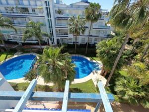 Bazén v ubytovaní Ático en Costa Ballena con Barbacoa, Aire Acondicionado y WIFI alebo v jeho blízkosti