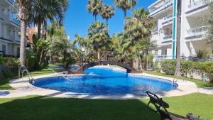 Bazén v ubytovaní Ático en Costa Ballena con Barbacoa, Aire Acondicionado y WIFI alebo v jeho blízkosti