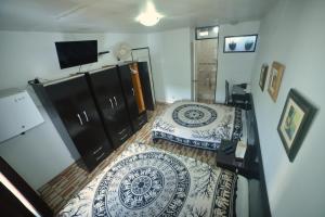 TV a/nebo společenská místnost v ubytování Residencial Carlos