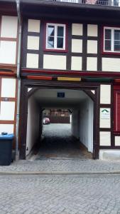 a tunnel in a building with a car in it at Apartment Halmis FeWo WR in Wernigerode