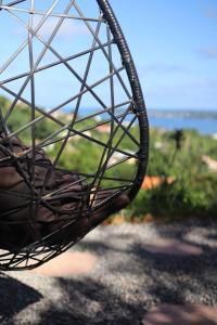 a persons hand holding the spokes of a bike tire at Lodges Mont-Vert in Le Robert