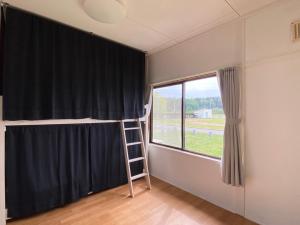 Fotografie z fotogalerie ubytování 東神楽大学ゲストハウス v destinaci Higashikagura
