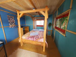 Postel nebo postele na pokoji v ubytování Open Gate Hostel Hawaii