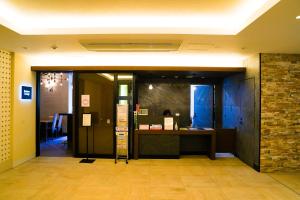 那覇市にあるBranchera Naha 1402のロビーのデスク付き事務所の入口