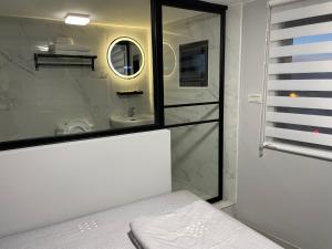 Wen Wen Sub BnB tesisinde bir odada yatak veya yataklar