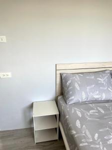Postel nebo postele na pokoji v ubytování Wen Wen Sub BnB