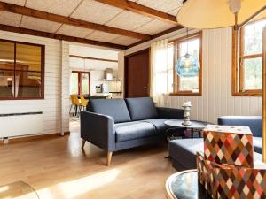 Posezení v ubytování 6 person holiday home in Spøttrup-By Traum
