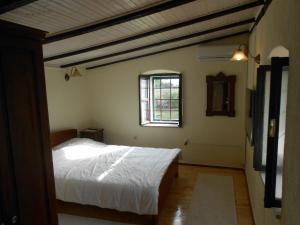Posteľ alebo postele v izbe v ubytovaní STONE House "DAN"