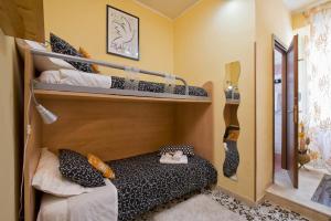 Postel nebo postele na pokoji v ubytování Vecchio Treno guest house