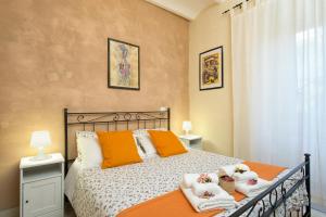 Postel nebo postele na pokoji v ubytování Vecchio Treno guest house