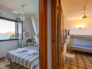 Ένα ή περισσότερα κρεβάτια σε δωμάτιο στο CASA FLAMINIO