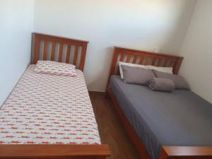 En eller flere senge i et værelse på Executive Two Bedroom Villa For Hire in Nadi