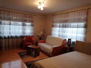 Posteľ alebo postele v izbe v ubytovaní Apartment GINA