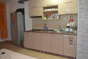 Kuchyň nebo kuchyňský kout v ubytování Hostel Valentin 2
