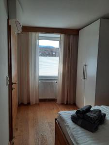 Ein Bett oder Betten in einem Zimmer der Unterkunft Mini-Apartment Admont