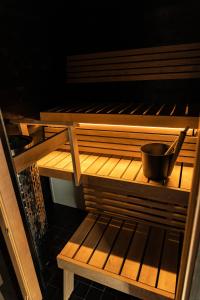 a wooden shelf with a bowl on top of it at Holiday Village Inari in Inari