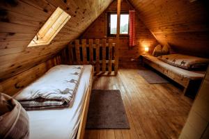Letto o letti in una camera di Almhütte Hebalm