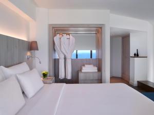 Letto o letti in una camera di Amus Hotel & Spa