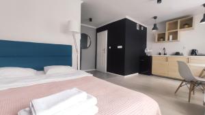 Posteľ alebo postele v izbe v ubytovaní Na Szaniec 17 by Homeprime + 3 fotografie