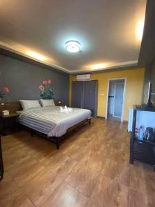 Postel nebo postele na pokoji v ubytování Nangnon Hill Hug Hotel