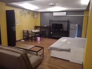 TV a/nebo společenská místnost v ubytování Nangnon Hill Hug Hotel