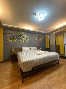 Postel nebo postele na pokoji v ubytování Nangnon Hill Hug Hotel