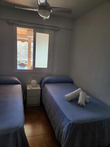 Posteľ alebo postele v izbe v ubytovaní Gerona Center Apartment + 27 fotografií