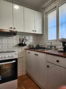 Kuchyňa alebo kuchynka v ubytovaní Gerona Center Apartment