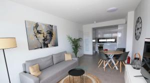 a living room with a couch and a table at Casa de Valentino in Villamartin