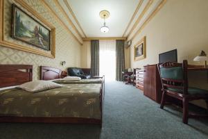 Postel nebo postele na pokoji v ubytování Bucharest Comfort Suites Hotel