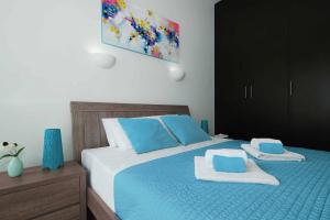 Postel nebo postele na pokoji v ubytování DIANA - Coralli Beachfront Apartment