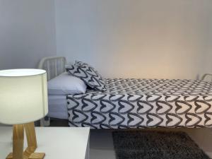 Łóżko lub łóżka w pokoju w obiekcie Low Island House