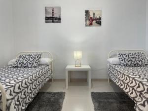 A bed or beds in a room at Low Island House