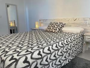 Łóżko lub łóżka w pokoju w obiekcie Low Island House