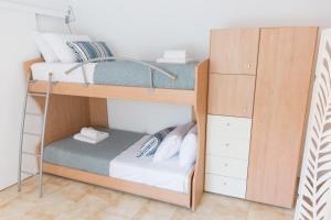 Postel nebo postele na pokoji v ubytování AGIAZI Poros Summer House