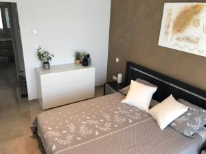 Postel nebo postele na pokoji v ubytování Maison LILOMEL