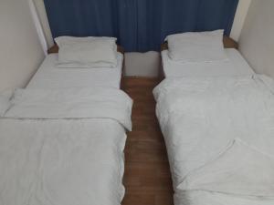 เตียงในห้องที่ Hotel Aerial View