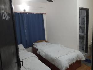 เตียงในห้องที่ Hotel Aerial View