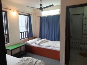 เตียงในห้องที่ Hotel Aerial View