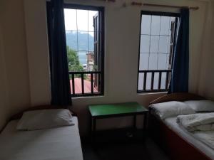 เตียงในห้องที่ Hotel Aerial View