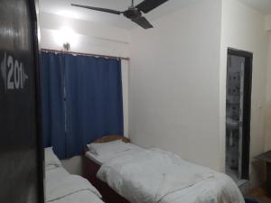 เตียงในห้องที่ Hotel Aerial View
