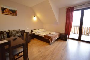Ένα ή περισσότερα κρεβάτια σε δωμάτιο στο Villa Asturia