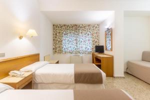 TV a/nebo společenská místnost v ubytování Hotel Leuka