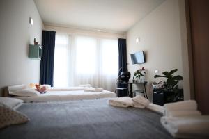 Postel nebo postele na pokoji v ubytování Casa a Colori Padova