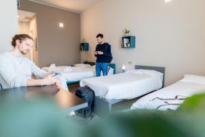 Postel nebo postele na pokoji v ubytování Casa a Colori Padova