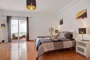 Postel nebo postele na pokoji v ubytování Villa Pacifica + 24 fotografií