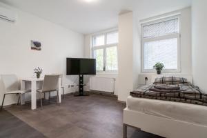 Telewizja i/lub zestaw kina domowego w obiekcie Apartmány U Jiříka
