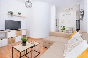 A television and/or entertainment centre at Victoria City Center Apartment