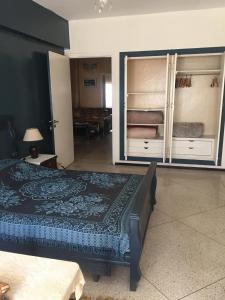 a bedroom with a bed and two bunk beds at Room in Guest room - Property located in a quiet area close to the train station and town in Casablanca